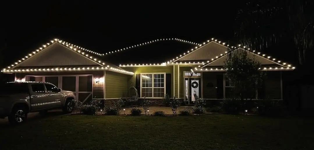 House with lights being removed by Heroic Lights